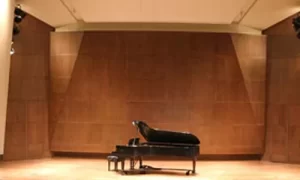 A piano on the stage of Nordstrom Recital Hall at Benaroya Hall